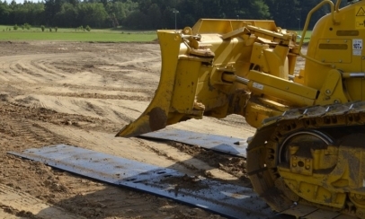 Load spreading mat without structure